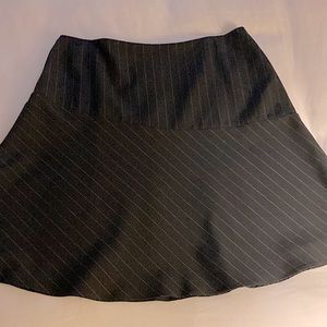 DKNY black skirt w/light grey pin stripes, fully lined.